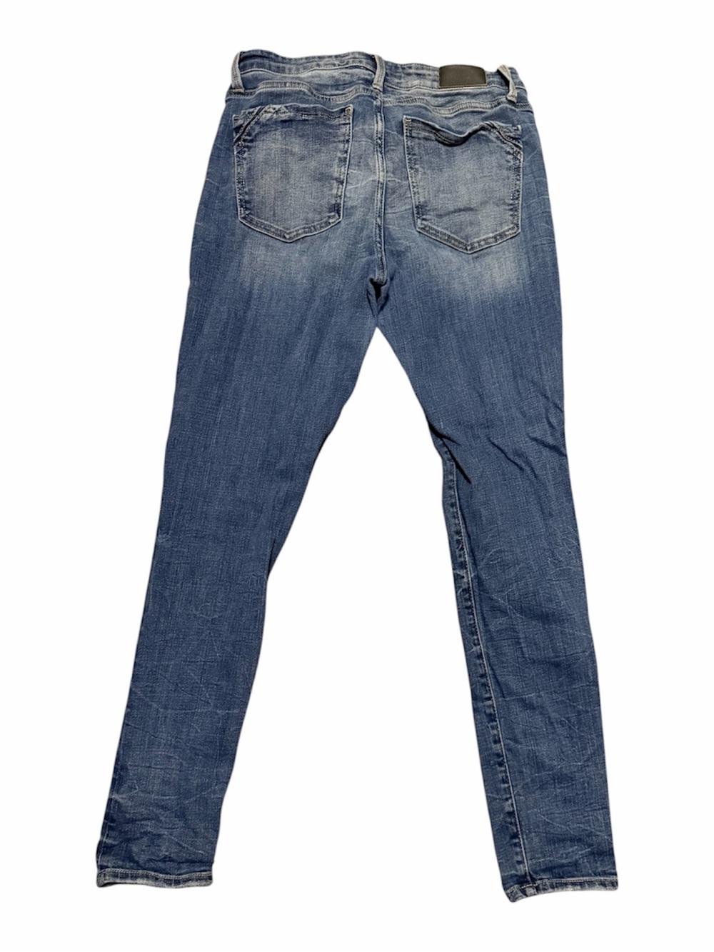 Women’s buckle black Skinny Stretch Denim Jeans in Washed Blue